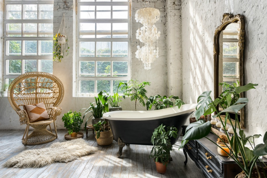 Cozy and comfortable room with interior in bohemian style tub