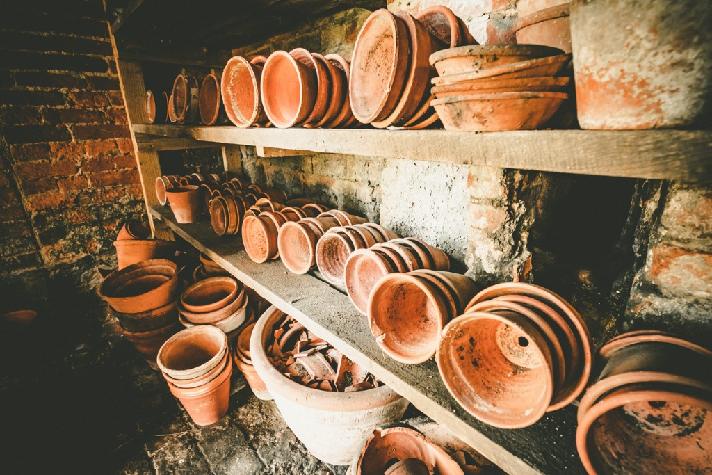 Terracotta pots in the gardeners potting shed
