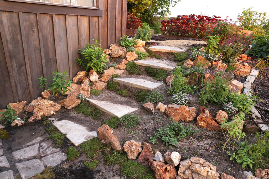 Rocky Stone Garden Steps Next to Cottage Shed and Herb Garden